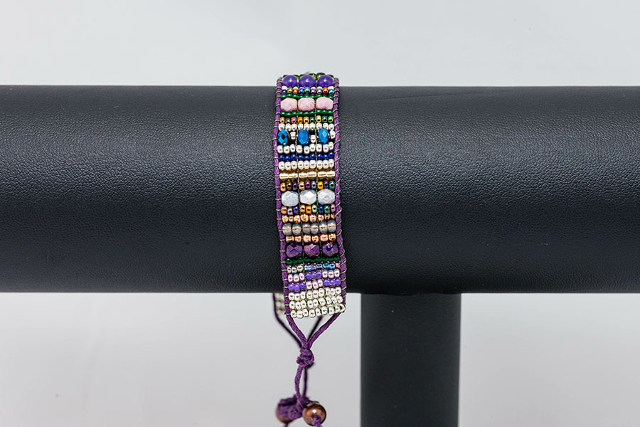 one side of a hand stitched flat beaded bracelet